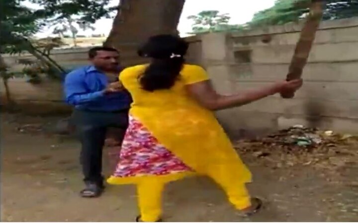 WATCH: Woman thrashes bank manager for allegedly asking sexual favours to approve loan; Video goes viral WATCH: Woman thrashes bank manager for allegedly asking sexual favours to approve loan; Video goes viral