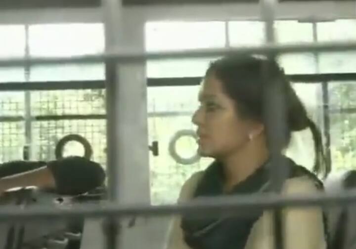 Violent protests and attacks on women, journalists were carried out by those opposing the Supreme Court’s verdict. In picture journalist Mausami Singh sitting in a police vehicle after she and her crew were attacked by the protesters at Nilakkal base camp. Image: ANI 