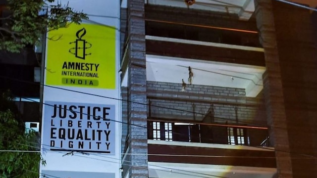 ED freezes bank accounts of Amnesty India; NGO says government instilling fear ED freezes bank accounts of Amnesty India; NGO commends raids, accuses govt of instilling fear