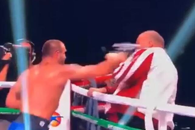 Maddening scenes as boxer Levan Shonia attacks own coach following defeat against Spas Genov Watch: Maddening scenes as boxer attacks his own coach following defeat