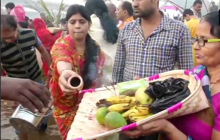 Woman offering Arghya to the rising sun in Odisha/ Image: ANI