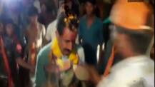 WATCH: Man garlands BJP MLA with shoes in public rally; gets thrashed by supporters