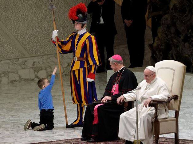 The Swiss Guards and Vatican gendarmes stood by when this happened./ AP IMAGE