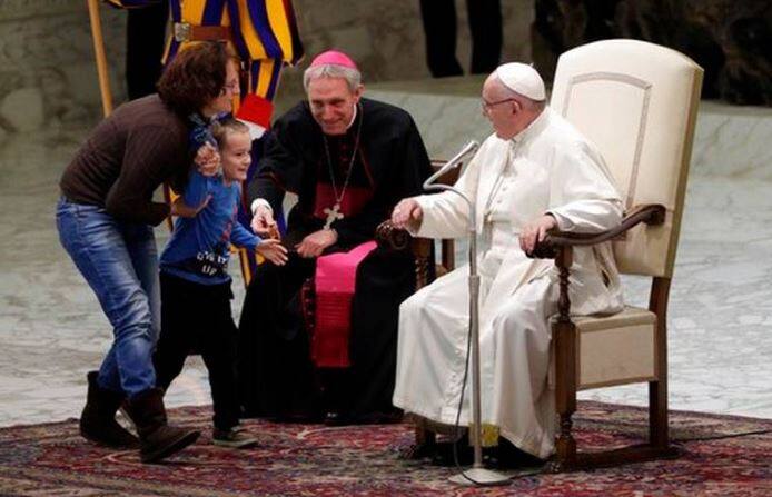 When Francis took the microphone, he explained in Spanish to the crowd that the child was speech-impaired. 