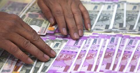 INR vs USD: Rupee posts massive gains; trades below 70 for first time since Aug 27 INR vs USD: Rupee posts massive gains; trades below 70 for first time since Aug 27