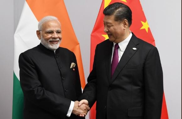 PM Modi meets Chinese Prez Xi, discusses ways to strenghten bilateral ties PM Modi meets Chinese Prez Xi, discusses ways to strengthen bilateral ties