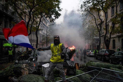 France Yellow Vest protests: Government suspends planned fuel price hike; all you need to know France 'Yellow Vest' Protests: Govt ditches planned hike in fuel prices; here is all you need to know about riots