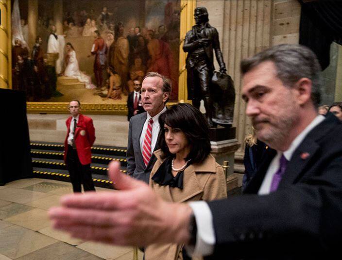 Neil Bush and his wife Maria pay their respects to the deceased American president / Image: AP