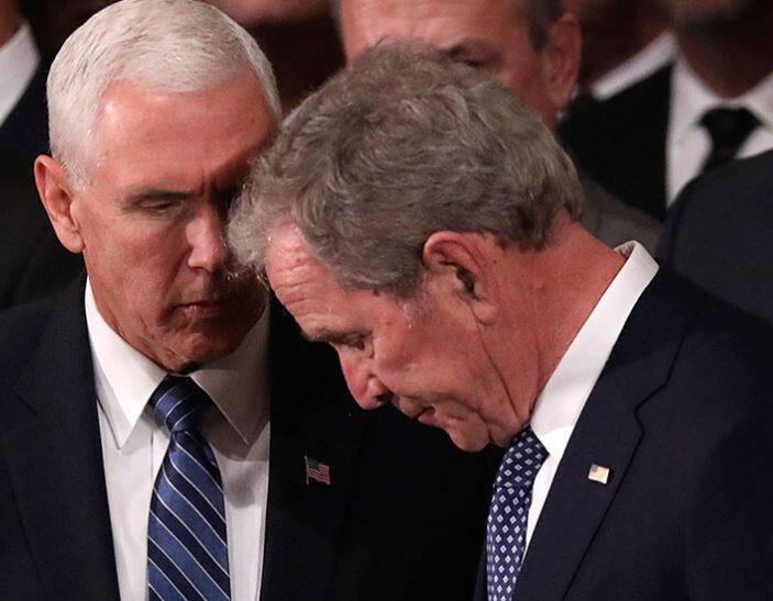 US Vice President Mike Pence talks to former US President George Bush at the ceremony/ Image: AP