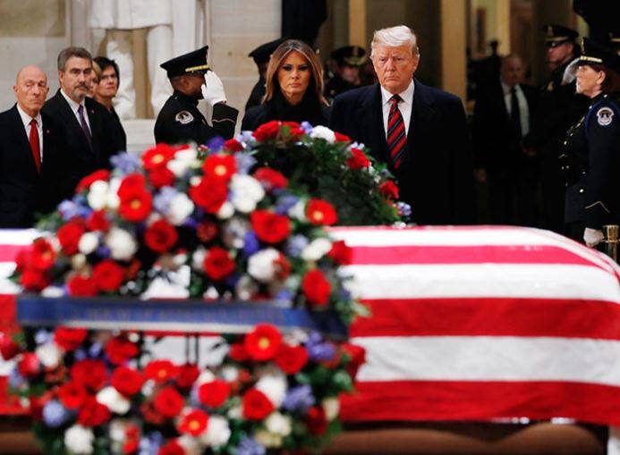 US President Donald Trump and First Lady Melania Trump paid respect to the last remains of the former President. / Image: AP