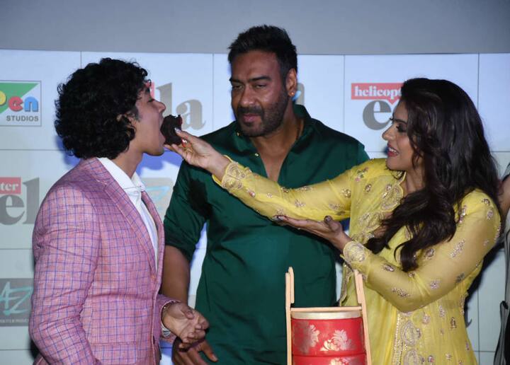 Kajol feeding her birthday cake to Riddhi Sen who plays her onscreen son in the film. (Photo: Photo: Manav Manglani)