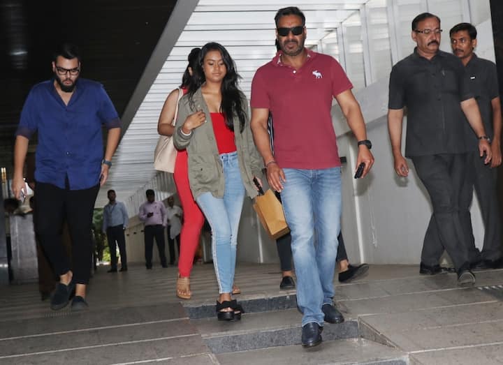Nysa walking alongside Daddy Ajay as they leave restaurant post family lunch