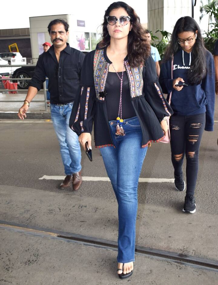 While Kajol wore an ethnic top with black spaghetti underneath and teamed it with blue denim while Nysa was in a dark blue hoodie with black ripped denims.