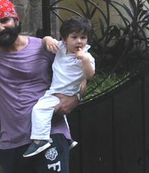 Saif Ali Khan gets snapped as he takes son Taimur Ali Khan out for a walk!