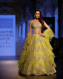 Malaika Arora stuns in a Green lehenga as she walks the ramp at 'Lakme Fashion Week 2018'!