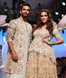 PICS: Mommy-to-be Neha Dhupia shows off her baby bump at 'Lakme Fashion Week 2018'!