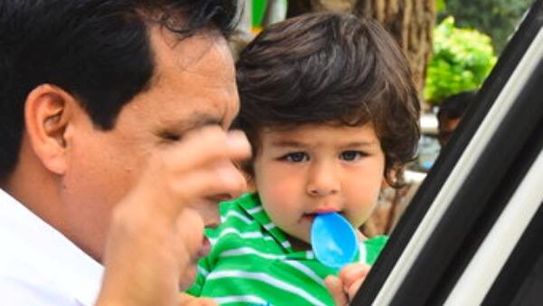 The adorable kid looked playfully into the camera and we couldn’t help but gush over his cuteness.