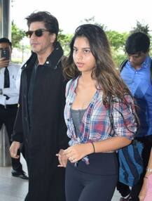 PICS: SRK & daughter Suhana walk hand-in-hand at the Airport as they leave for London!