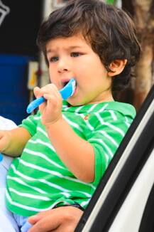 Super-adorable Taimur with mommy Kareena visits aunt Karisma Kapoor's house!