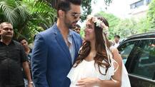 PICS: Pregnant Neha Dhupia glows as she poses with hubby Angad Bedi at her baby shower!