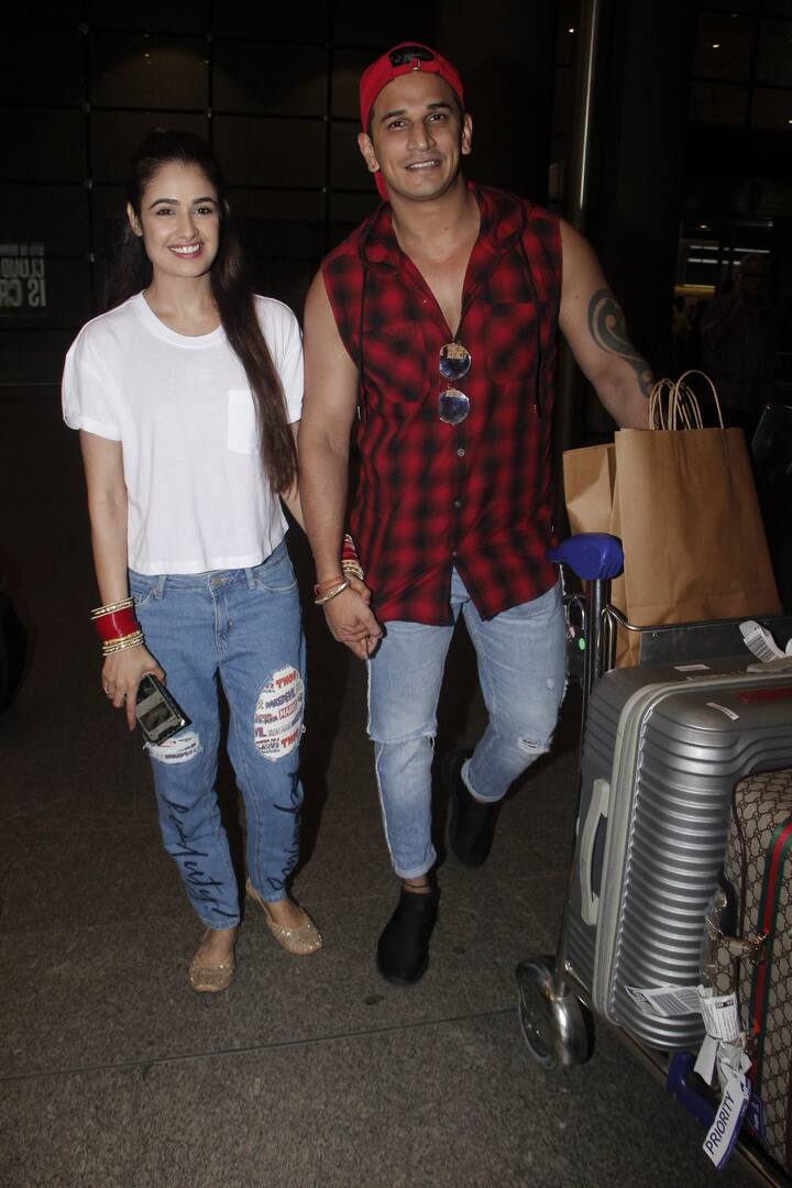 At the Airport, Prince refused to let go of wife Yuvika. Here's a picture of the couple posing for the paparazzi holding hands. (Photo: Manav Manglani)