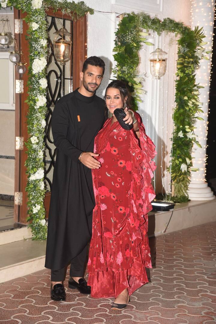 Mommy-to-be Neha Dhupia flaunted her baby bump as she attended the bash with actor-hubby Angad Bedi. (Photo: Manav Manglani)