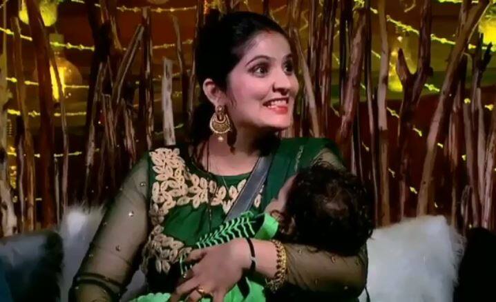 Romil's wife (a member of Zila Parishad in Karnal district) with son OJ recently entered the 'BB 12' house to meet Romil. (Photo: Colors)