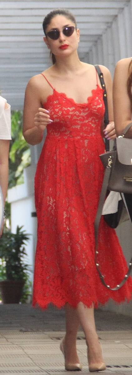 Kareena looked drop dead gorgeous in a red lace dress with red lipstick on as she went out for lunch with cousins. (Pic: Manav Manglani)