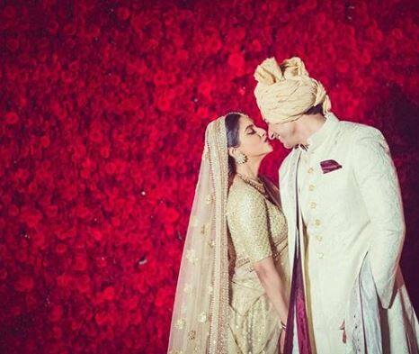 Here’s another picture where Asin can be seen with her husband. They look so cute in this picture, isn't it?