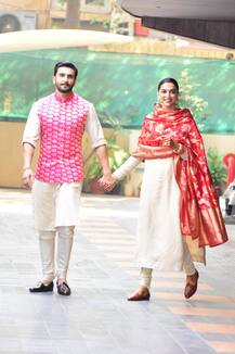 PICS: Newlyweds Ranveer Singh & Deepika Padukone reach home for Griha Pravesh!