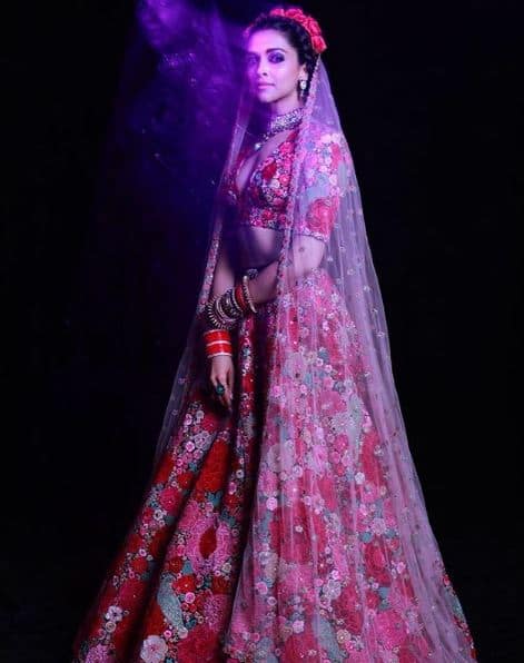 Deepika, who is a true fashionista, looked stunning in a Sabyasachi Mukherjee floral lehenga. The Bollywood diva wore a floral lehenga with pink, red and blue rose motifs.