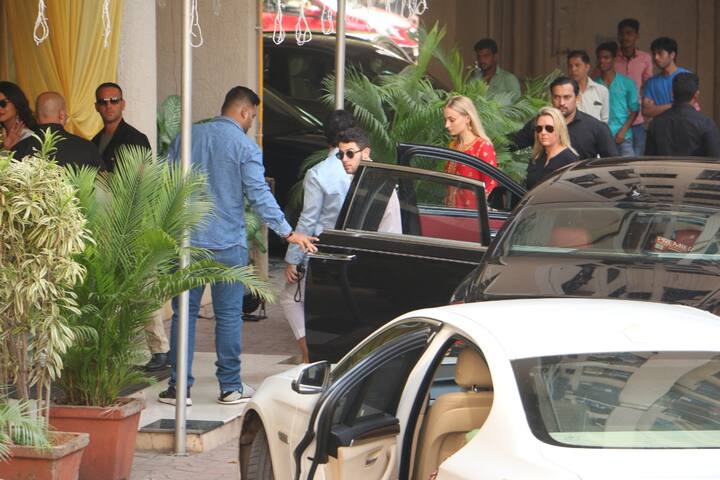 Priyanka-Nick arriving at her parents' house in the morning today for the Puja before heading for their Jodhpur wedding