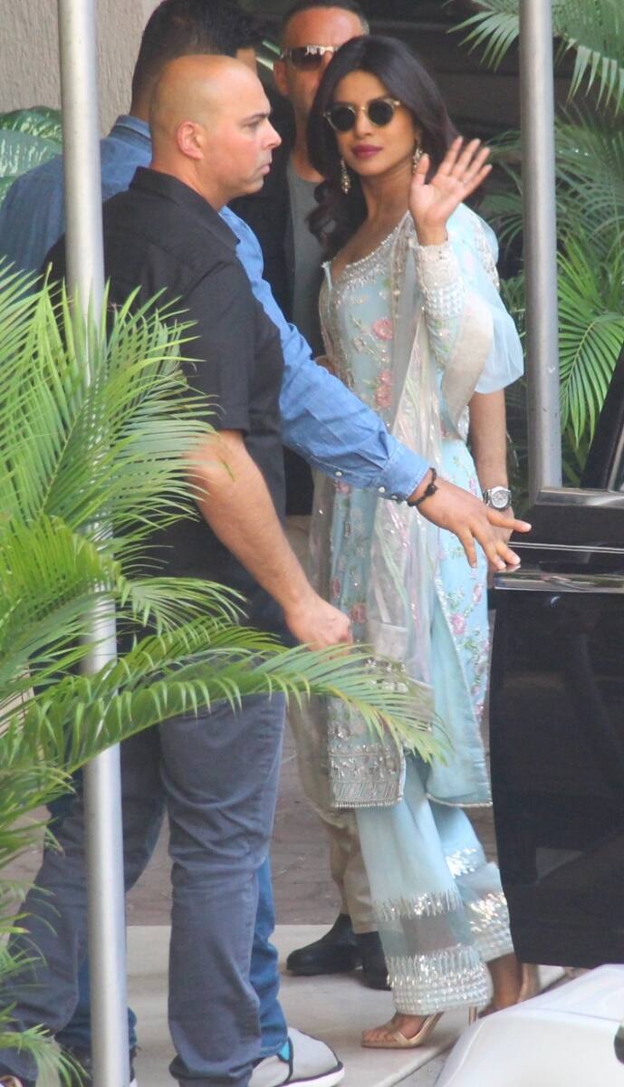 Priyanka-Nick arriving at her parents' house in the morning today for the Puja before heading for their Jodhpur wedding