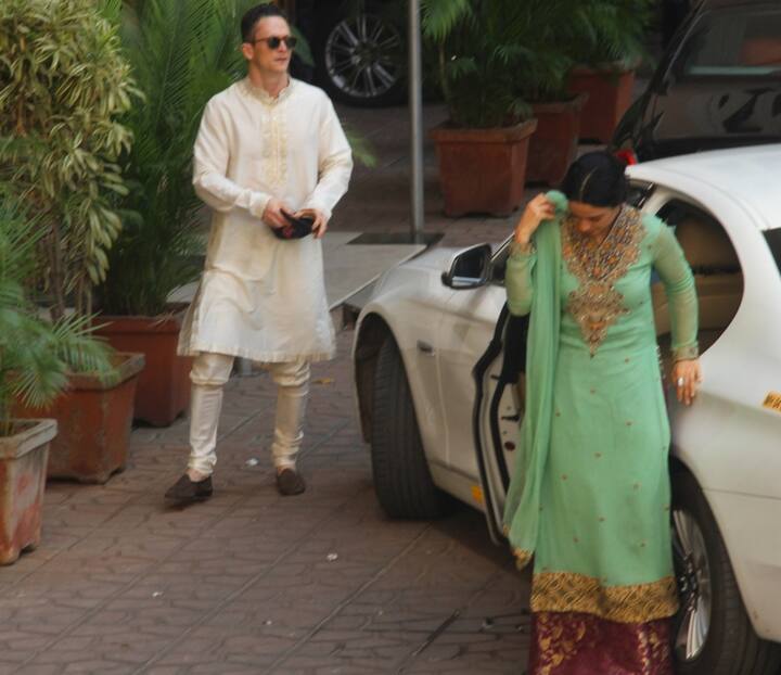 Priyanka-Nick arriving at her parents' house in the morning today for the Puja before heading for their Jodhpur wedding