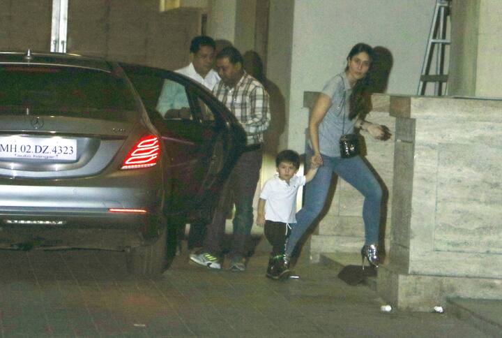 Kareena in a casual tee with denims and high heels arriving with Taimur for Amrita Arora's get-together