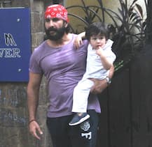Saif Ali Khan gets snapped as he takes son Taimur Ali Khan out for a walk!