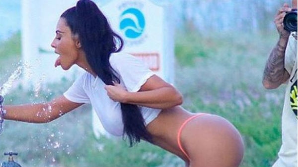 PICS: Reality TV star Kim Kardashian poses in a G-string thong at the beach for a hot photo shoot! PICS: Reality TV star Kim Kardashian poses in a G-string thong at the beach for a hot photo shoot!