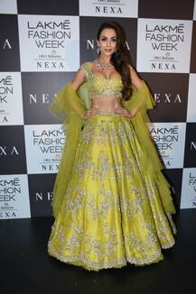Malaika Arora stuns in a Green lehenga as she walks the ramp at 'Lakme Fashion Week 2018'!