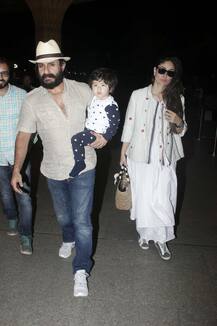 IN PICS: Saif-Kareena and a SLEEPY Taimur Ali Khan leave for Maldives for family vacation!