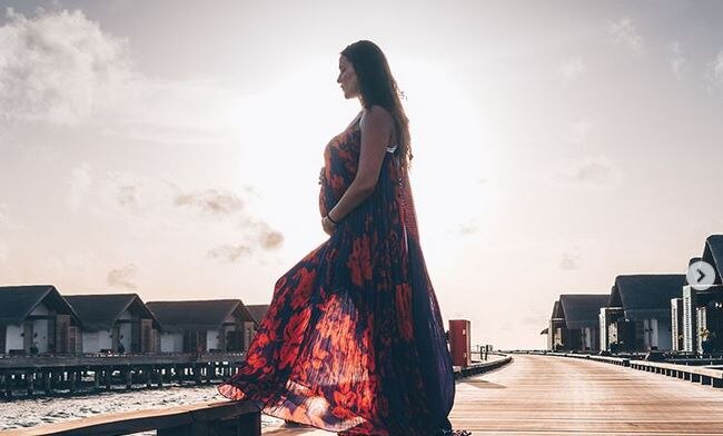 Neha Dhupia posts pictures from Maldives flaunting BABY BUMP Neha Dhupia posts pictures from Maldives flaunting BABY BUMP