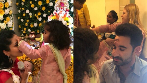 Ganesh Chaturthi 2018, Day 2: Sunny Leone with her kids & hubby Daniel Weber seeks blessings from 'bappa'! Ganesh Chaturthi 2018, Day 2: Sunny Leone with her kids & hubby Daniel Weber seeks blessings from 'bappa'!