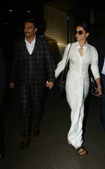 PICS: Ranveer Singh & Deepika Padukone spotted holding hands at airport as they return from Delhi!