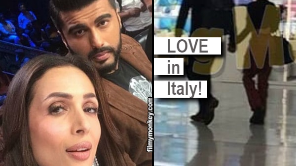 Malaika Arora-Arjun Kapoor spotted walking hand-in-hand at Milan airport, Pic answers Karan Johar's 