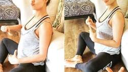PICS: After announcing PREGNANCY, Surveen Chawla flaunts her BABY BUMP while doing Yoga!