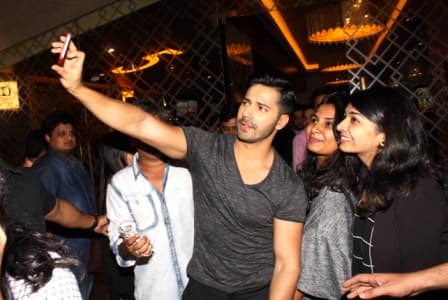 Varun Dhawan clicking selfies with female fans