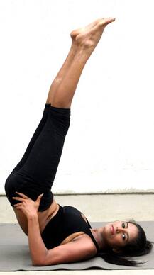 PHOTO GALLERY: HOT Poonam Pandey doing some asanas to mark International Yoga Day!