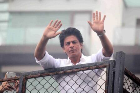 Bollywood actor Shahrukh Khan waves towards his fans on occasion of Eid al-Fitr celebrationss at his residence Mannat, in Mumbai, India on July 7, 2016. (Pravin Utturkar/SOLARIS IMAGES)