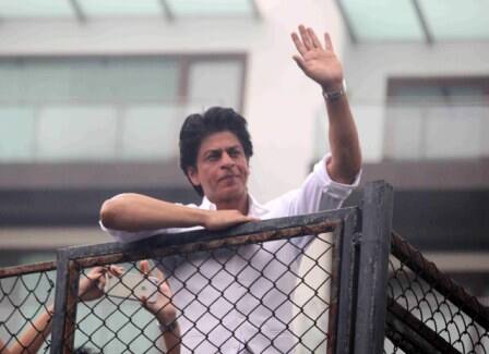 Bollywood actor Shahrukh Khan waves towards his fans on occasion of Eid al-Fitr celebrationss at his residence Mannat, in Mumbai, India on July 7, 2016. (Pravin Utturkar/SOLARIS IMAGES)