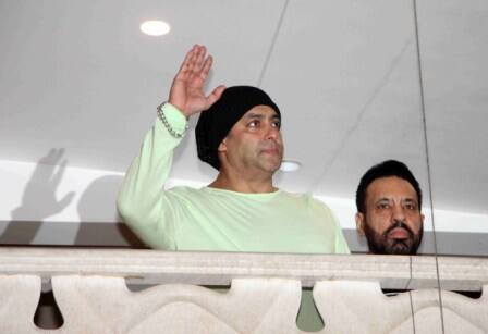 Bollywood actor Salman Khan waves towards his fans on occasion of Eid al-Fitr celebrations at his residence, in Mumbai, India on July 7, 2016. (Nikesh Gurav/ SOLARIS IMAGES)