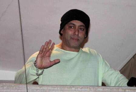 Bollywood actor Salman Khan waves towards his fans on occasion of Eid al-Fitr celebrations at his residence, in Mumbai, India on July 7, 2016. (Nikesh Gurav/ SOLARIS IMAGES)